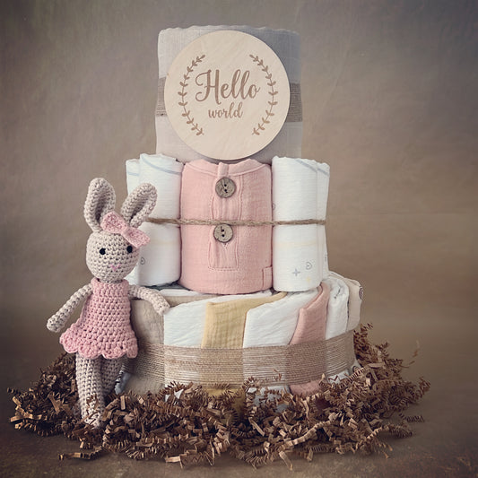 Overflowing Love: Tutti Cutie Gifts Baby Shower Diaper Cake with Muslin Blanket, Organic Outfit, Crochet Bunny Doll, and More!