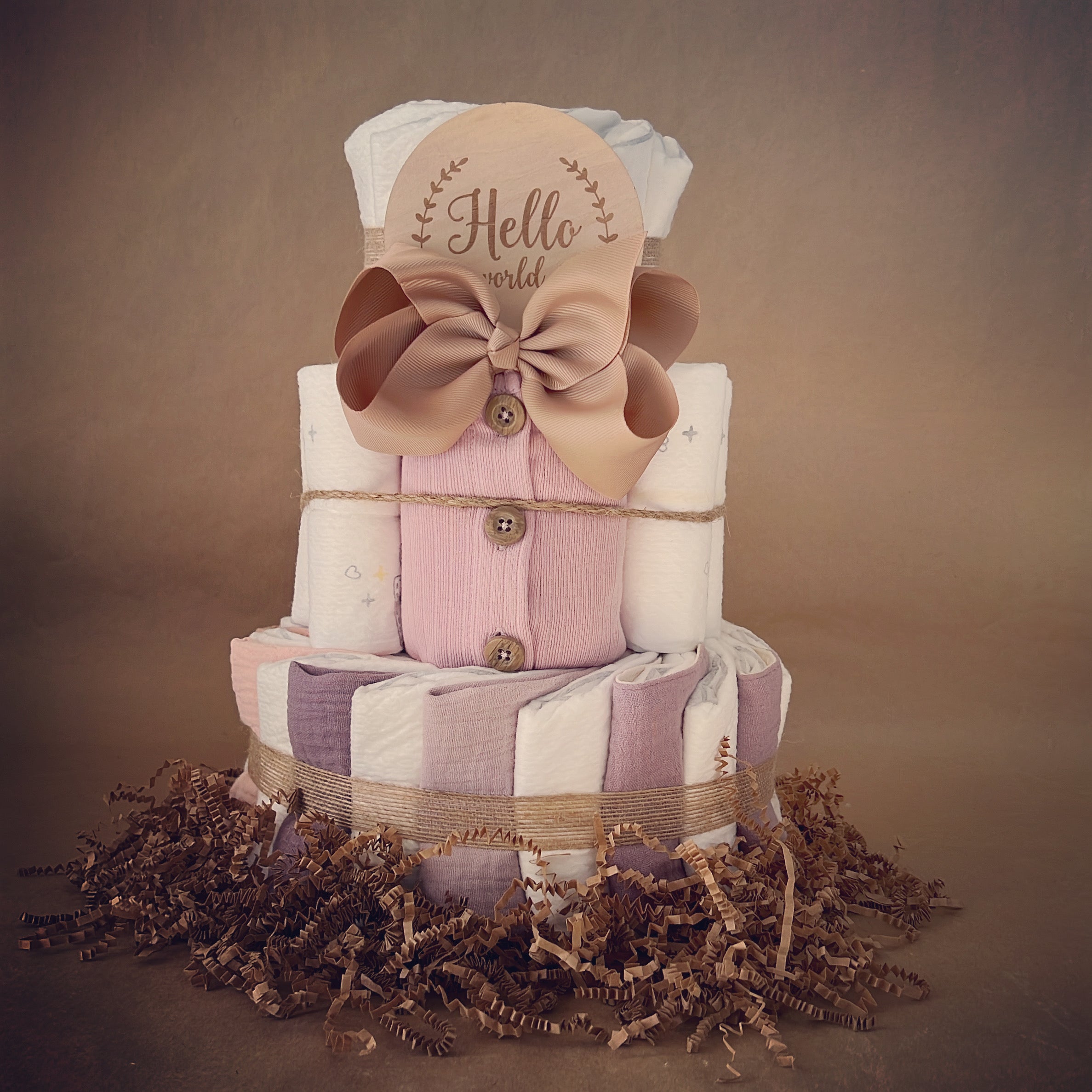 Pink and store purple diaper cake